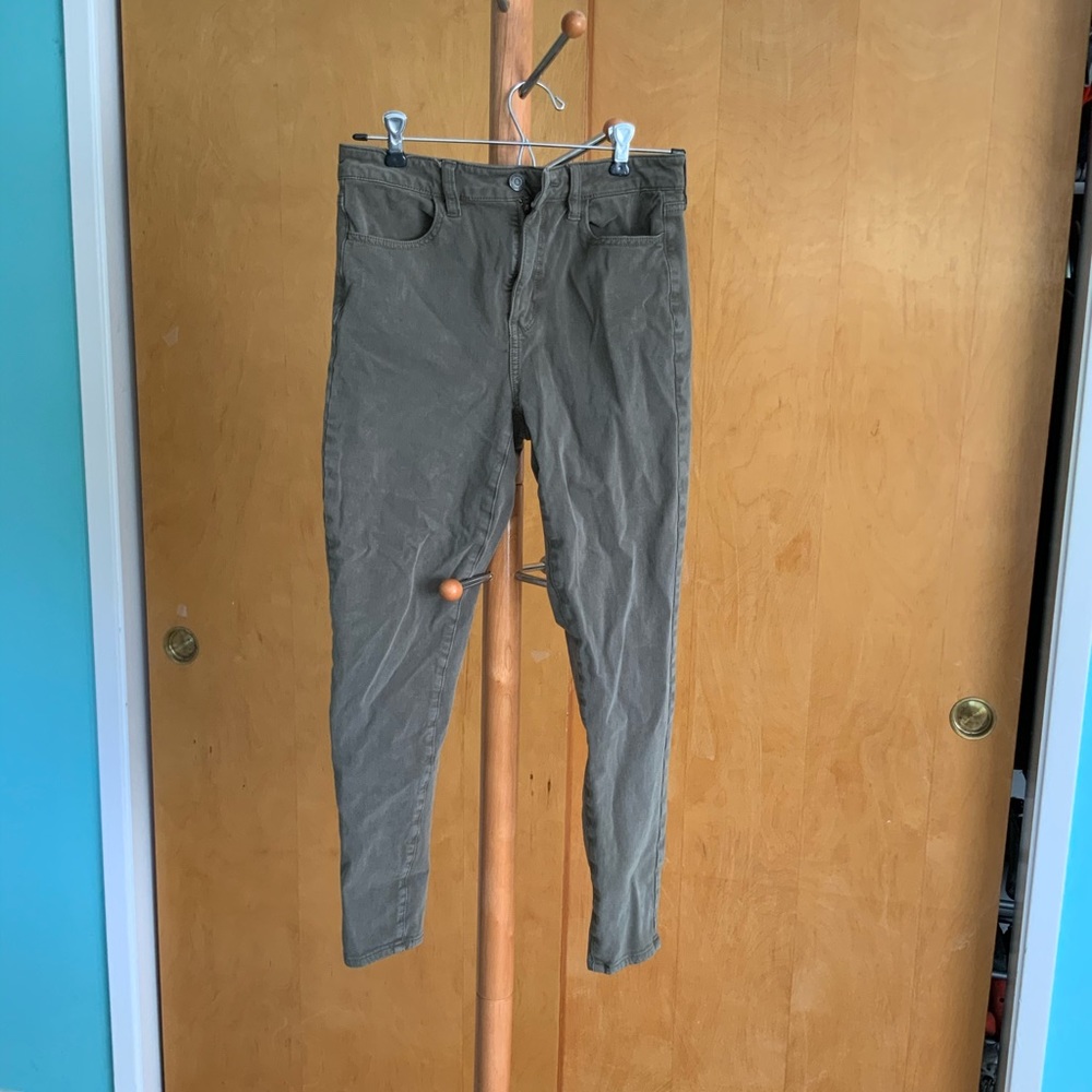 Olive green skinny jeans.